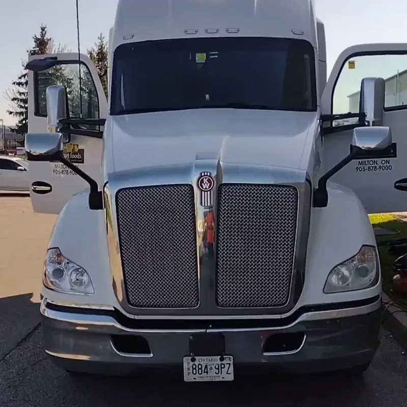 White semi truck being detailed